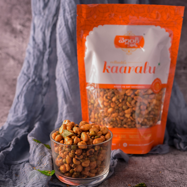 https://cdn.shopify.com/s/files/1/1857/6931/files/VellankiFoods-NavarathnaMixture2.png?v=1716901326